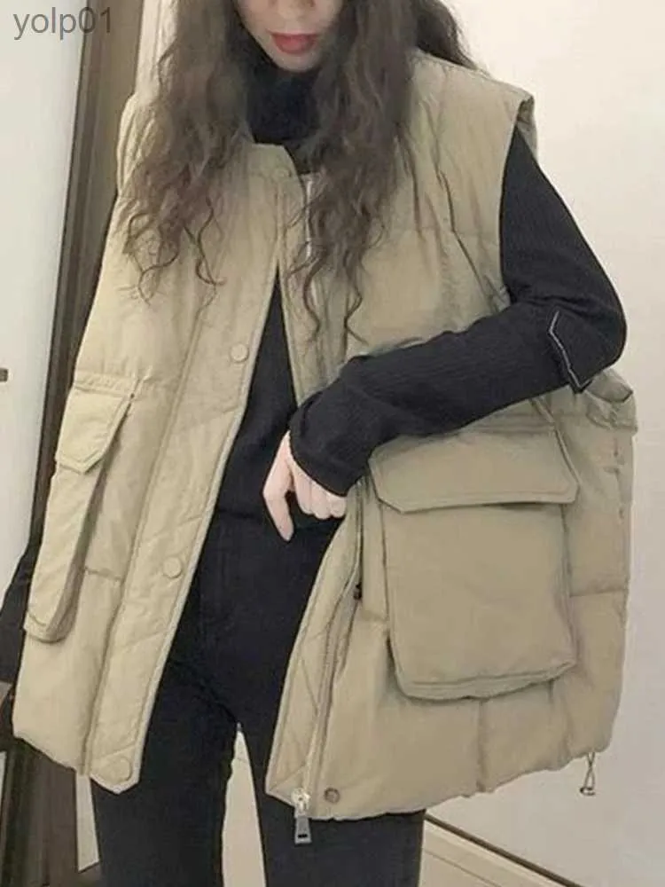 Parkas pour femmes vers le bas gilet rembourré femmes surdimensionné sans manches vestes Fe automne hiver épais manteau chaud dame Vintage col montant Puffer VestsL231118