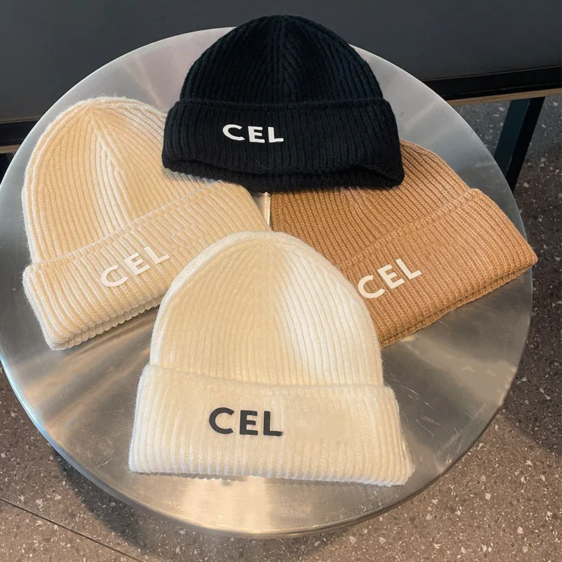 Designer fashion hot selling autumn and winter universal knitted hats for men and women, plush, thickened, warm and cold resistant wool hats, wholesale of brimless hats