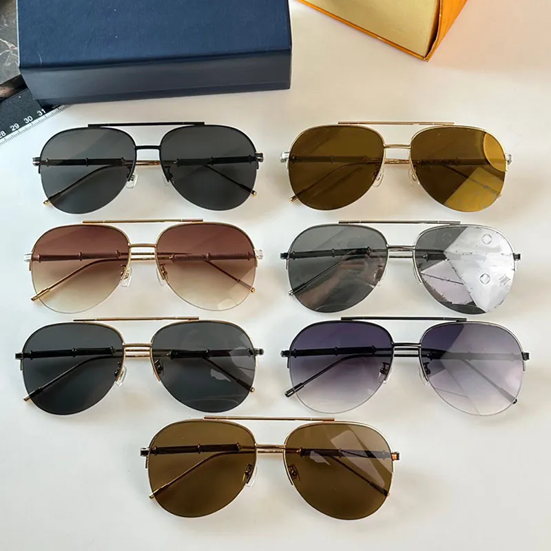 Designer Luxury 1.1 Oval Metal Frame Z2024E Fashionable Men and Womens Driving, Leisure Vacation, Mirror Legs temples with engraved flower signature gradient glasses