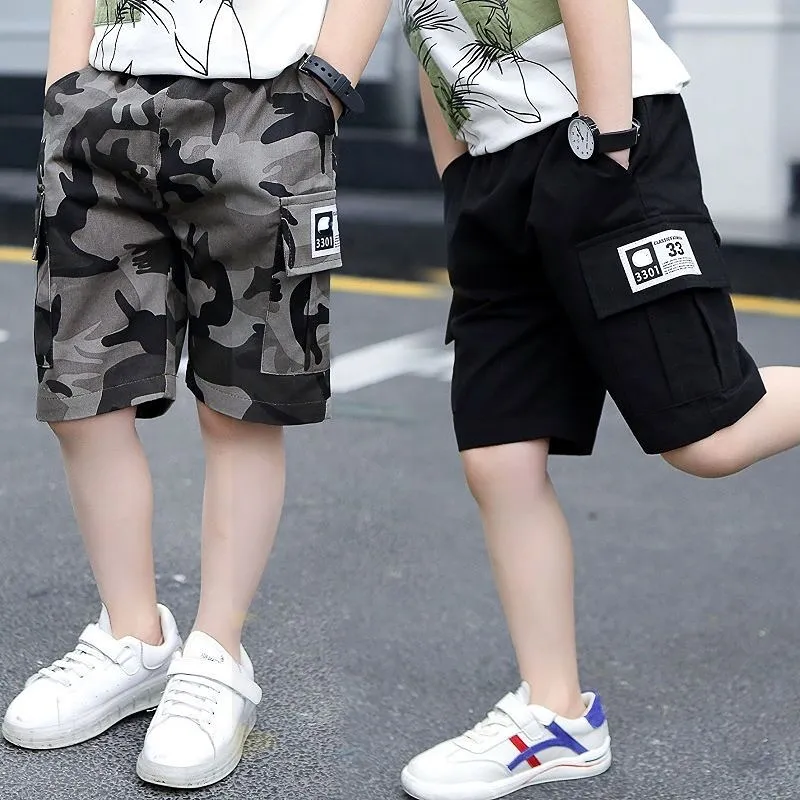 Shorts shorts meninos de menino de verão esportes de camuflagem solta shorts elástica cintura adolescente calça de crianças 2-14 anos 230419