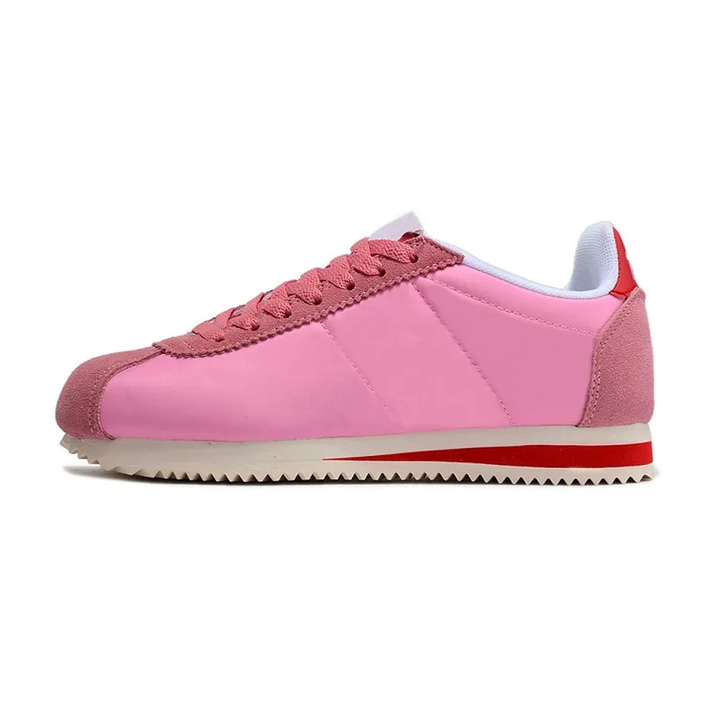 Nike classic cortez leather lux trainers in bone and metallic clearance bronze