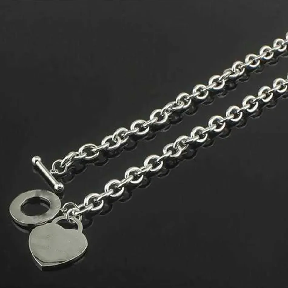 Regalo di San Valentino stabilito dei gioielli dell'acciaio di titanio della collana del progettista della donna del braccialetto Cuore di trasporto libero