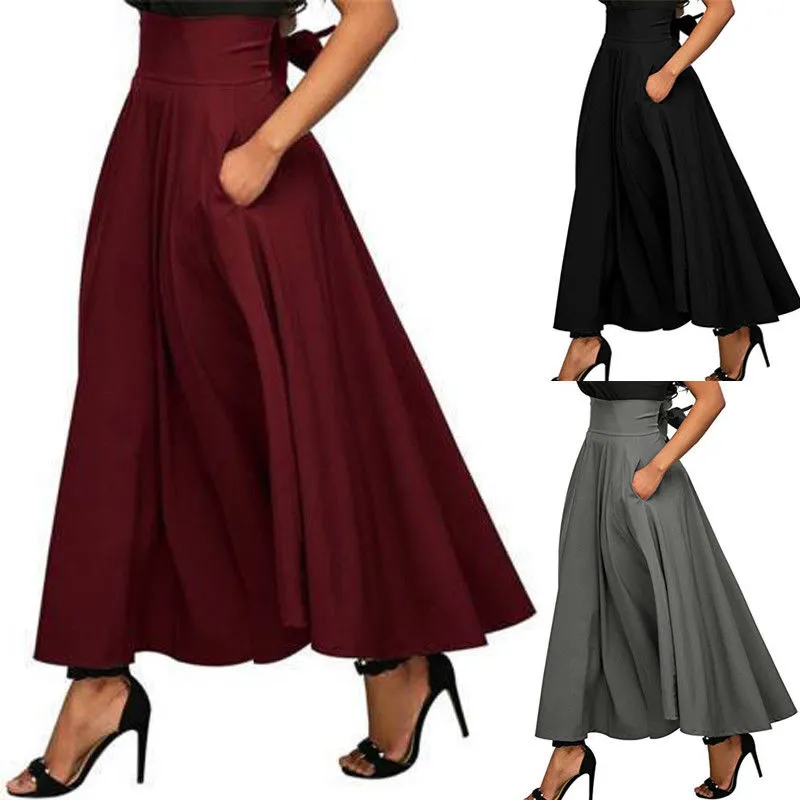 Kjolar kvinnor a-line kjol elegant mode hög midja blossade veckade långa maxi fickor rufsar solid färg sexiga damer kläder 230419