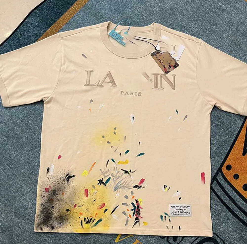 lanvin skjorta män t-shirts mens ss23 designer lanvins t shirt shorts mode och kvinnor beige speckle alfabet tryck trendig trend casual lös halva ärm vit qeoy