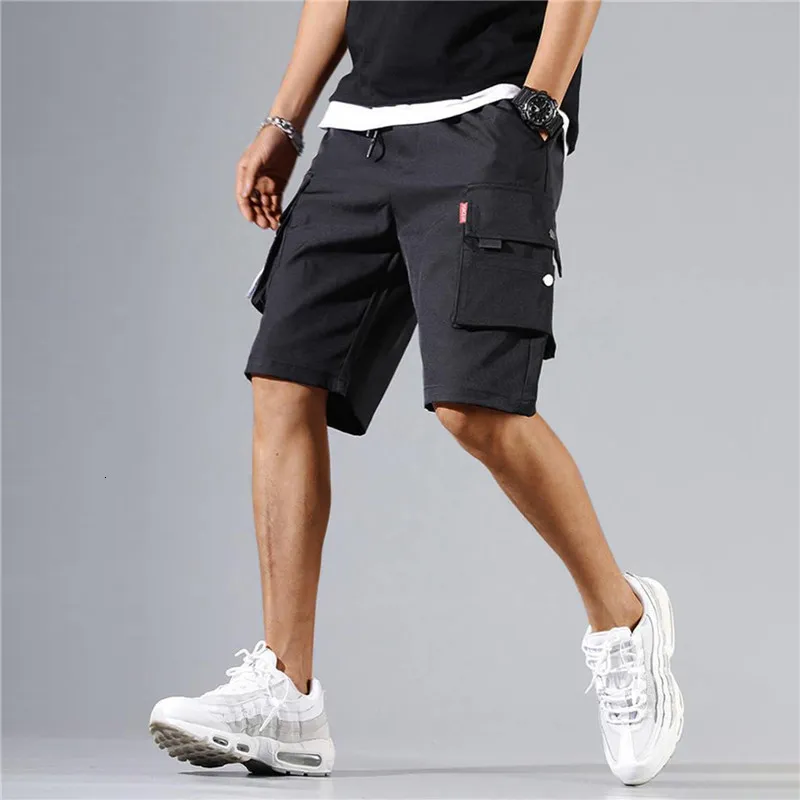 Pantaloncini da uomo Casual Pantaloni sportivi larghi Tuta 2023 Moda estiva Bermuda Beach Marchio di alta qualità 230419