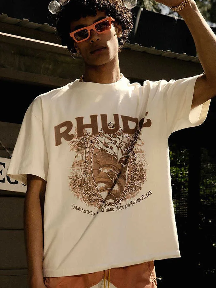 Tasarımcı Moda Giyim Tees Hip hop Tişörtleri Xiaozhong Trend Marka Rhude Yaz Çiçek Vintage Gevşek Ins Saf Pamuklu Çift Vtg T-shirt Erkekler Gevşek Streetwear