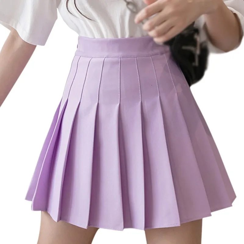 Spódnice seksowne kobiety krótka spódnica urocza kobieta plisowana w talii stałe kolor mini lato 230419