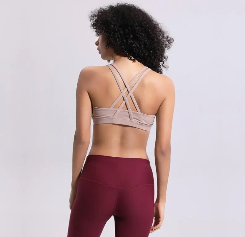 CA49 Mulheres Crossing Yoga Sports Bra Camisas Ginásio Colete Push Up Fitness Tops Sexy Roupa Interior Lady Tops Shakeproof Alça Ajustável Bra7418431