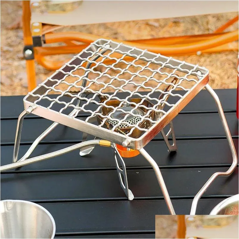 Poêles Poêles Mtifonctionnel Pliant Campfire Grill Portable En Acier Inoxydable Cam Grate Cuisinière À Gaz Stand Bois Extérieur 231114 Drop Deliver Dhvcj