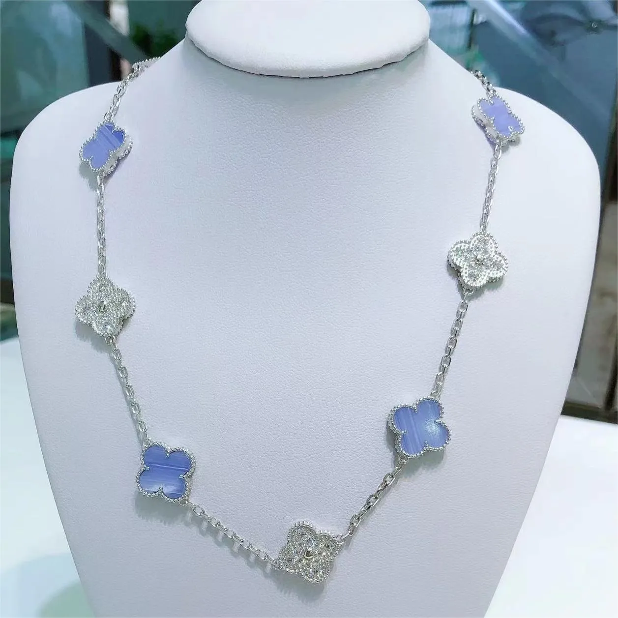 Diseñador de trébol de cuatro hojas de lujo Collar Peandant Elegante Diez flores Gargantilla clásica Bling Diamante Piedra púrpura Para mujer Moissanite Cadena Collares Joyería