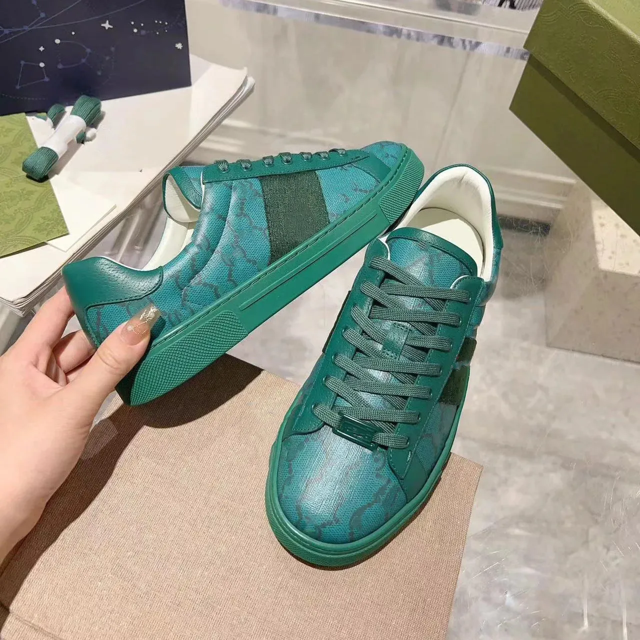 Green and best sale red stripe trainers