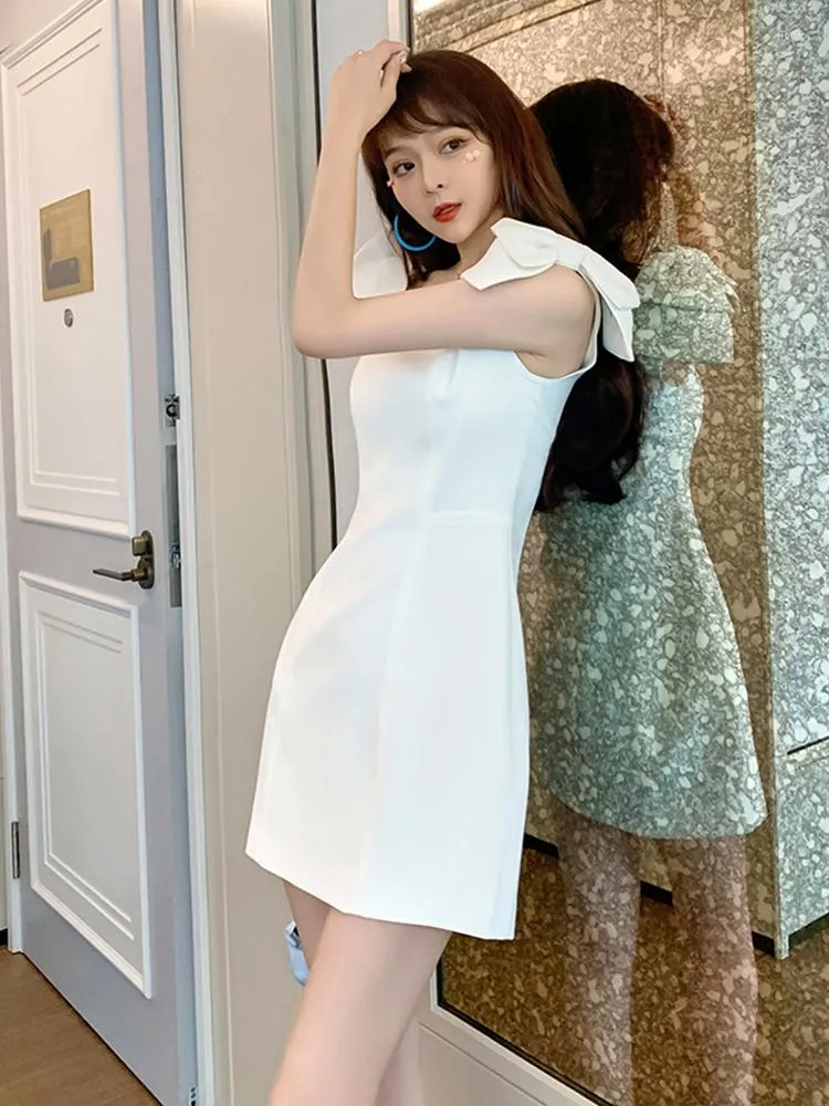 Nya avslappnade klänningar sommarklassiker Sweet Women Dress Solid White Black Bow Camisole ärmlös rygglös mini Empire midjeflickan klänning