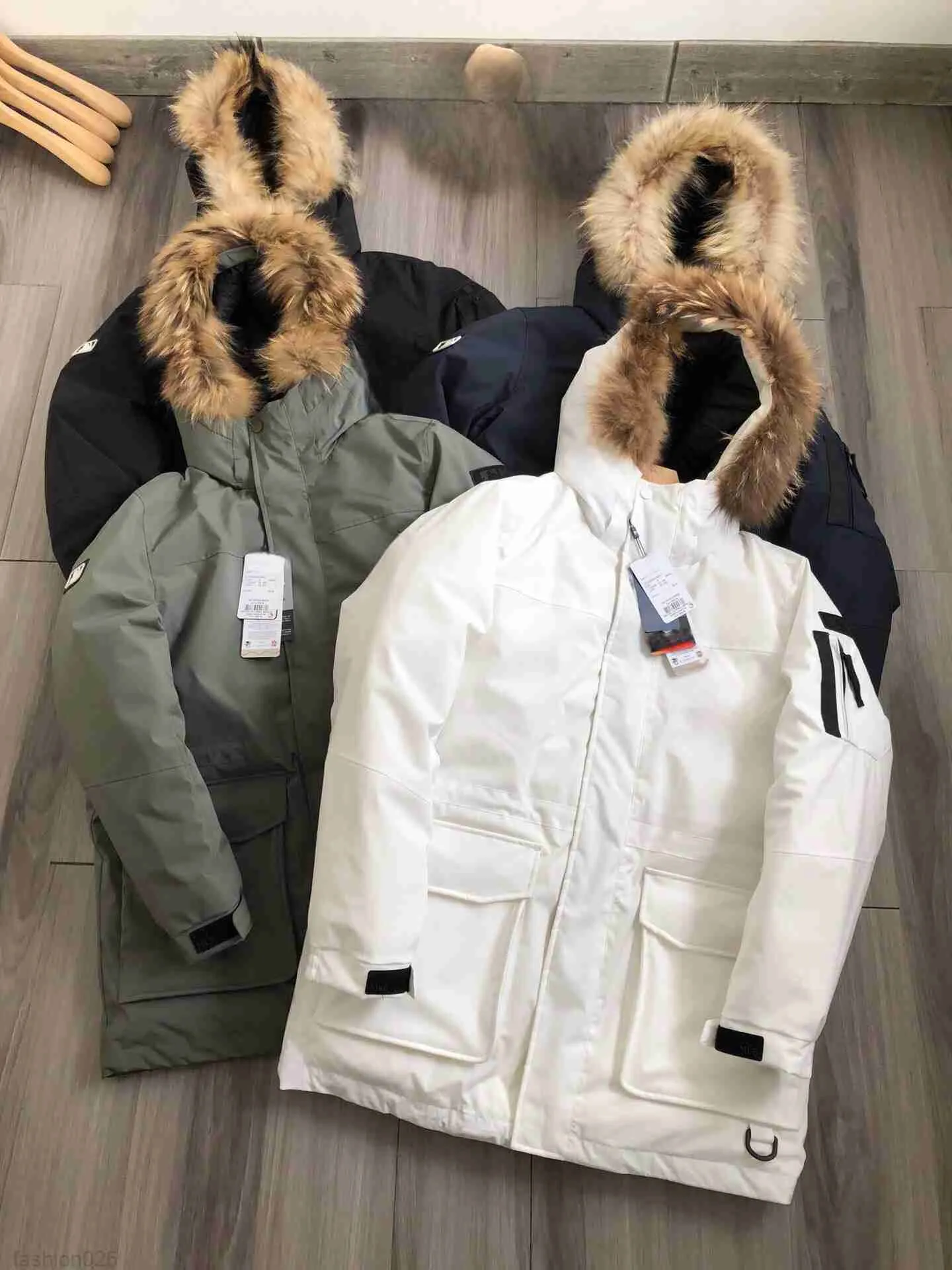 Designer Down Jacket Fashion Brand Coat broderade herr- och kvinnors tvättbjörn päls krage huva ner kappa lång kappa europeiska och amerikanska sizess8wc