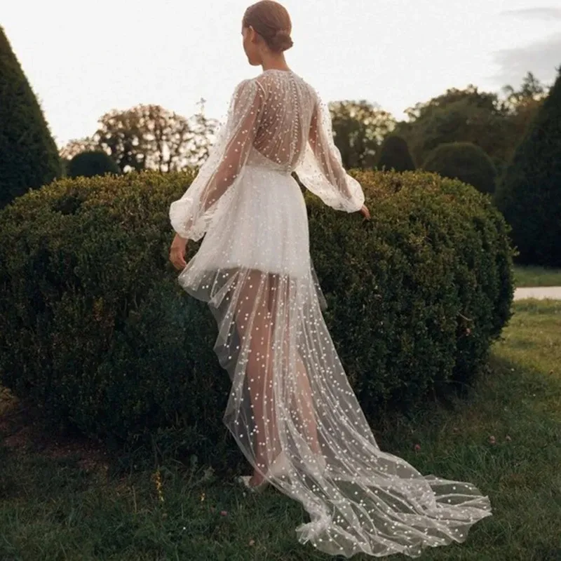 Boho High Low Polka Dot line a wedding dress with Puffy Sleeves, Button Back, and Sheer Neckline for Summer Brides Boho High Low Polka Dot line a wedding dress with Puffy Sleeves, Button Back, and Sheer Neckline for Summer Brides