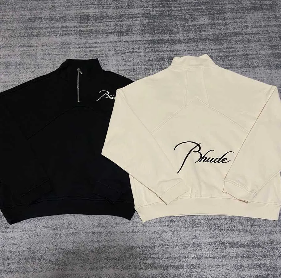 Vêtements de créateurs Sweats à capuche Rhude Style américain Automne Hiver Col montant Demi-fermeture à glissière Lettre Broderie Couture Pull ample pour femme