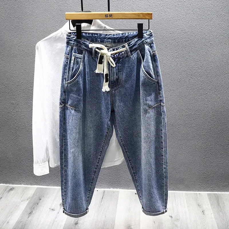 Jeans para hombres 2023 Primavera Otoño Cordón Moda coreana Slim Tapered Drapeado Harem Pantalones Masculino Street Denim 231121