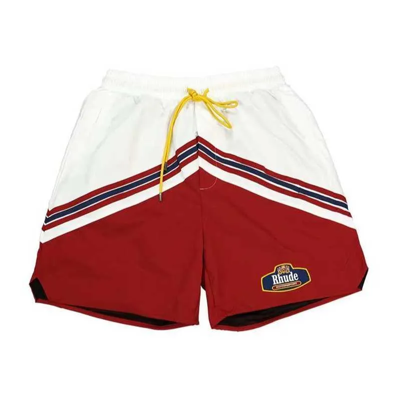 2023 shorts de designer rhude shorts cápsulas masculinas calças de praia de verão material de malha respirável suor solto de fitness calças de basquete