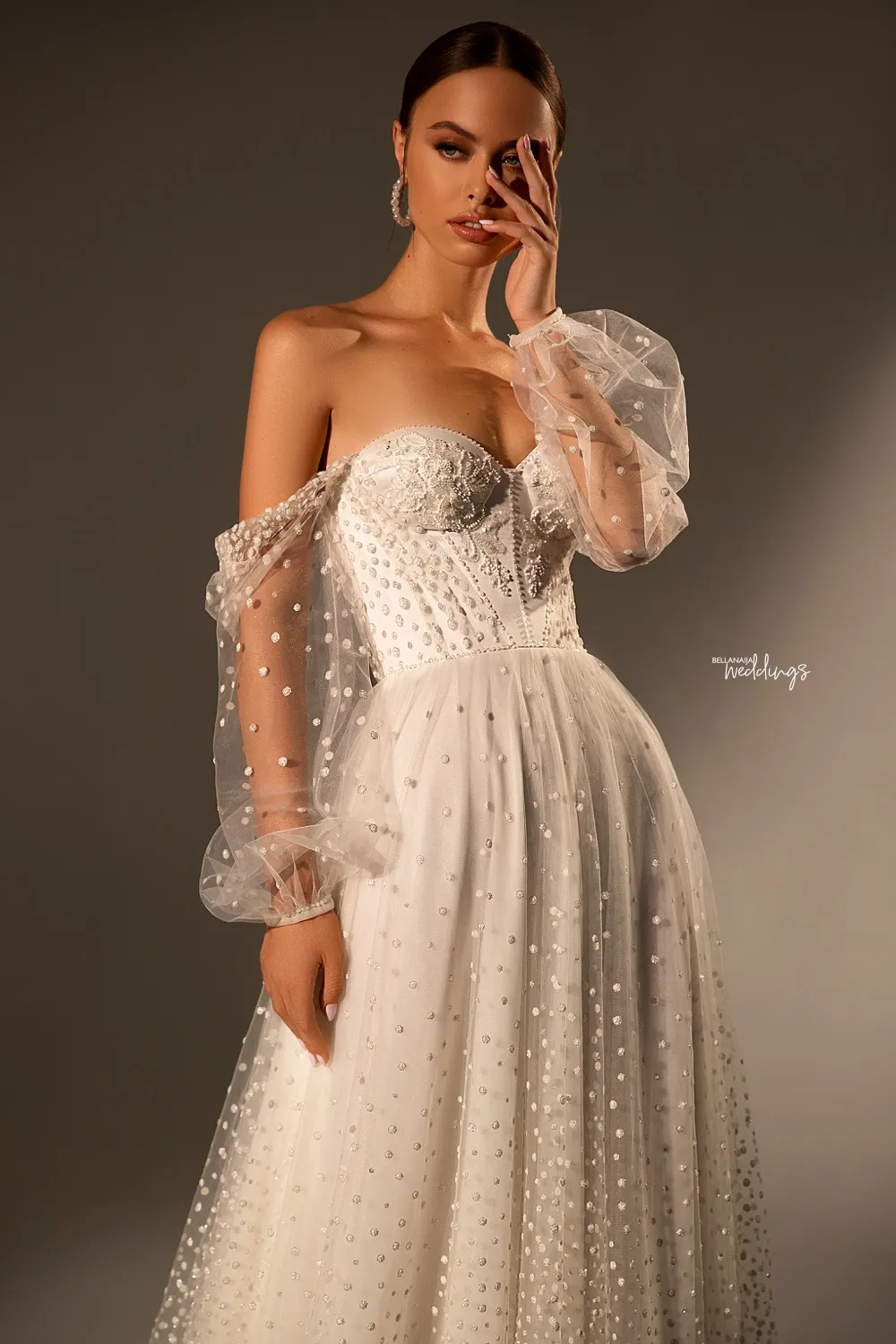long sleeve polka dot wedding dress TYNE is an elegant long sleeved wedding gown with lace and polka dot skirt
