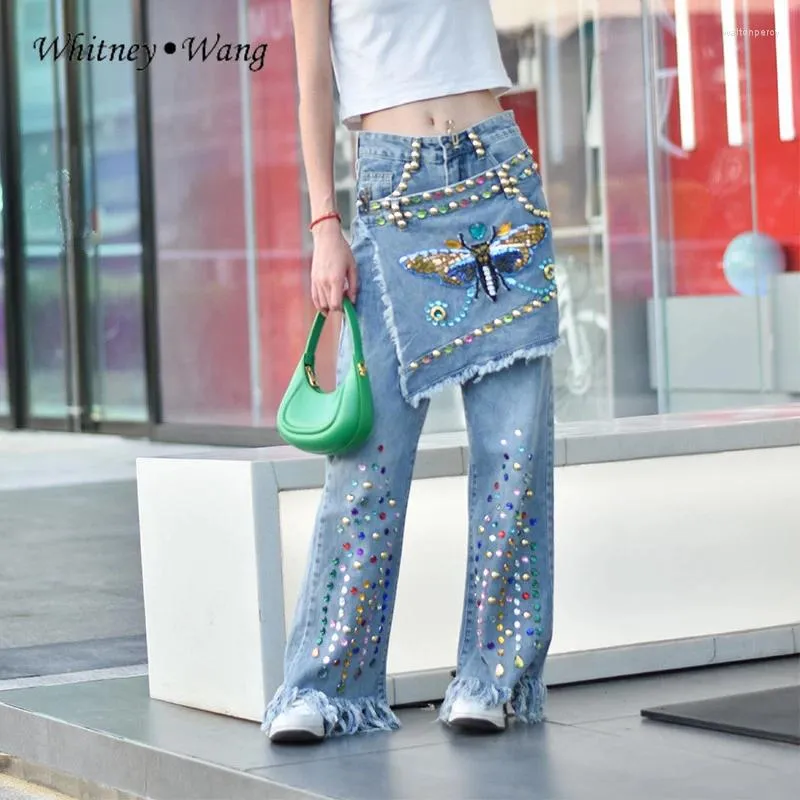 Kvinnors jeans designer stil vår mode streetwear paljetter fjäril kristaller kvinnor denim byxor