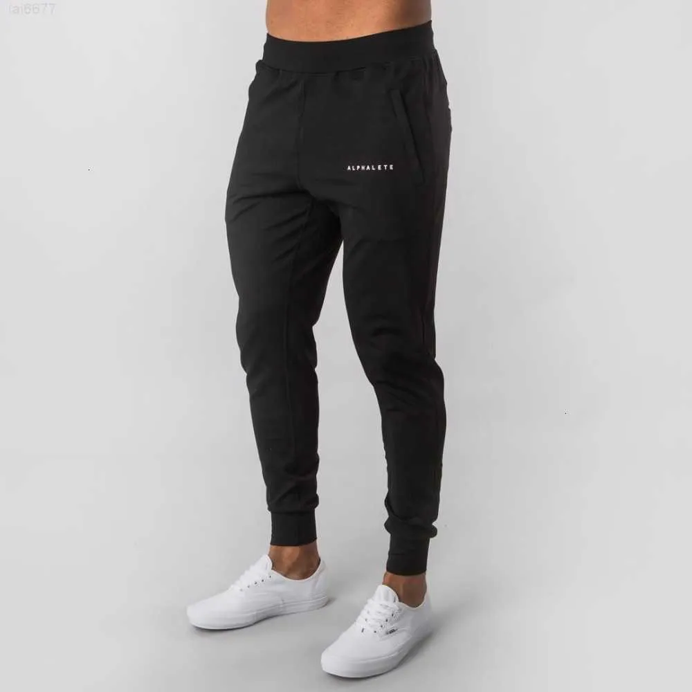 Alphalete New Style Mens Brand Jogger Sweatpants Man Gyms Workout Fitness  Cotton Trousers Male Casual Fashion Skinny Track Pantsschq