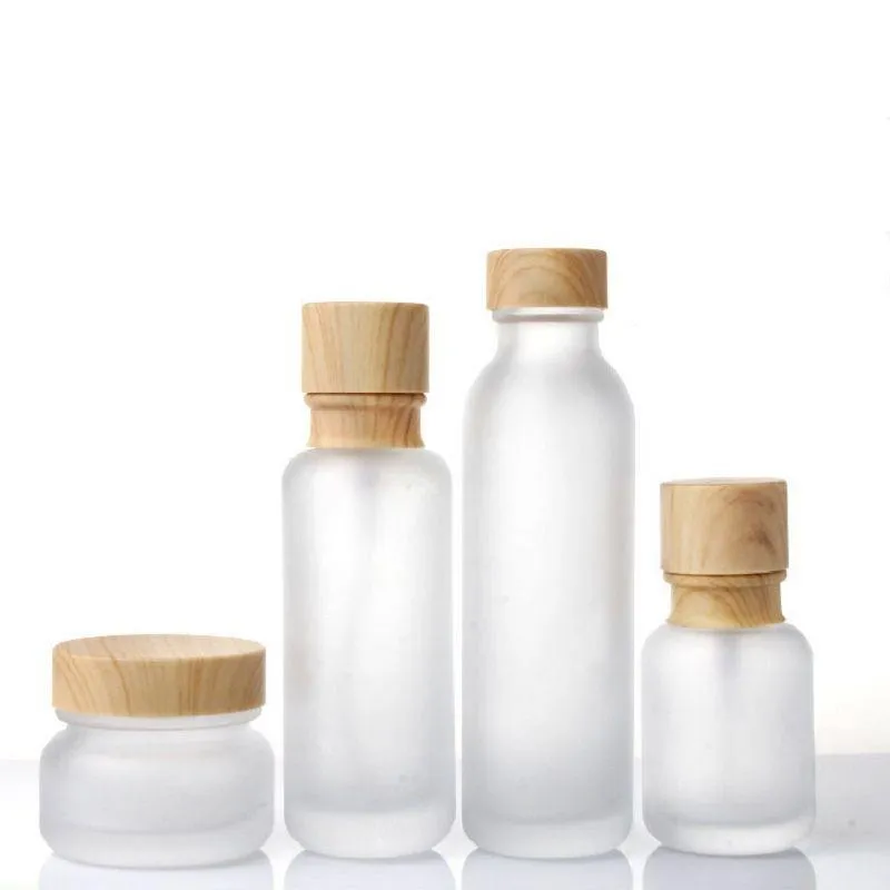 Frosted Glass Jar Cream Flaskor Runt kosmetiska burkar Hand Face Lotion Pump Bottle With Wood Cap Euljc