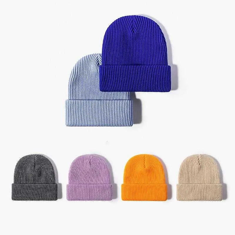 Beanie Skull Caps Moda autunno e inverno cappello lavorato a maglia senza tesa protezione termica monocromatica schiaffo Cappello di lana Donna Cappello freddo da uomo marea