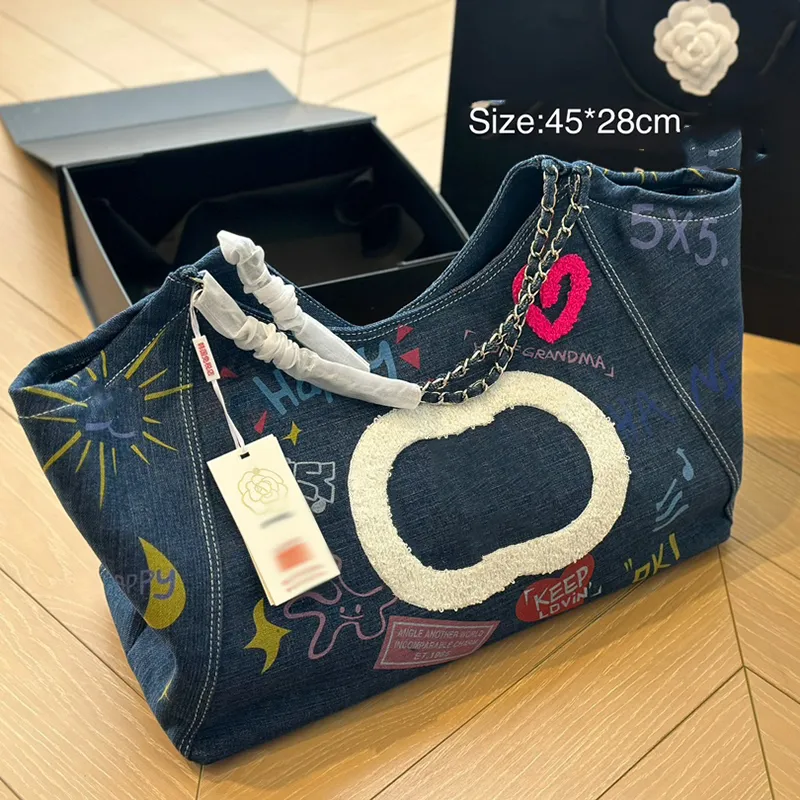 Denim tas 45cm luchthaventas Designer damesschoudertas Mooie geschilderde print Zilver Hardware Metaal Luxe handtas Gematelasseerde ketting Crossbodytassen Reizen Sacoche