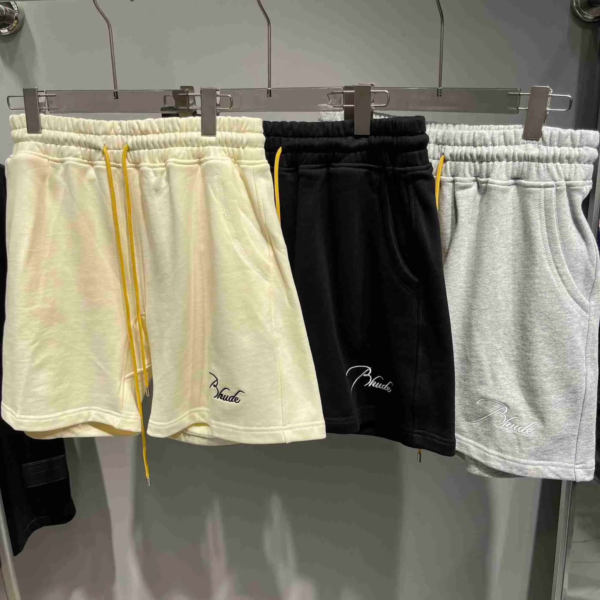 Ropa de diseñador American Rhude Pantalones cortos americanos bordados Capris de moda Pantalones cortos deportivos con cordón suelto Parejas Joggers Ropa deportiva Fitness en la playa al aire libre