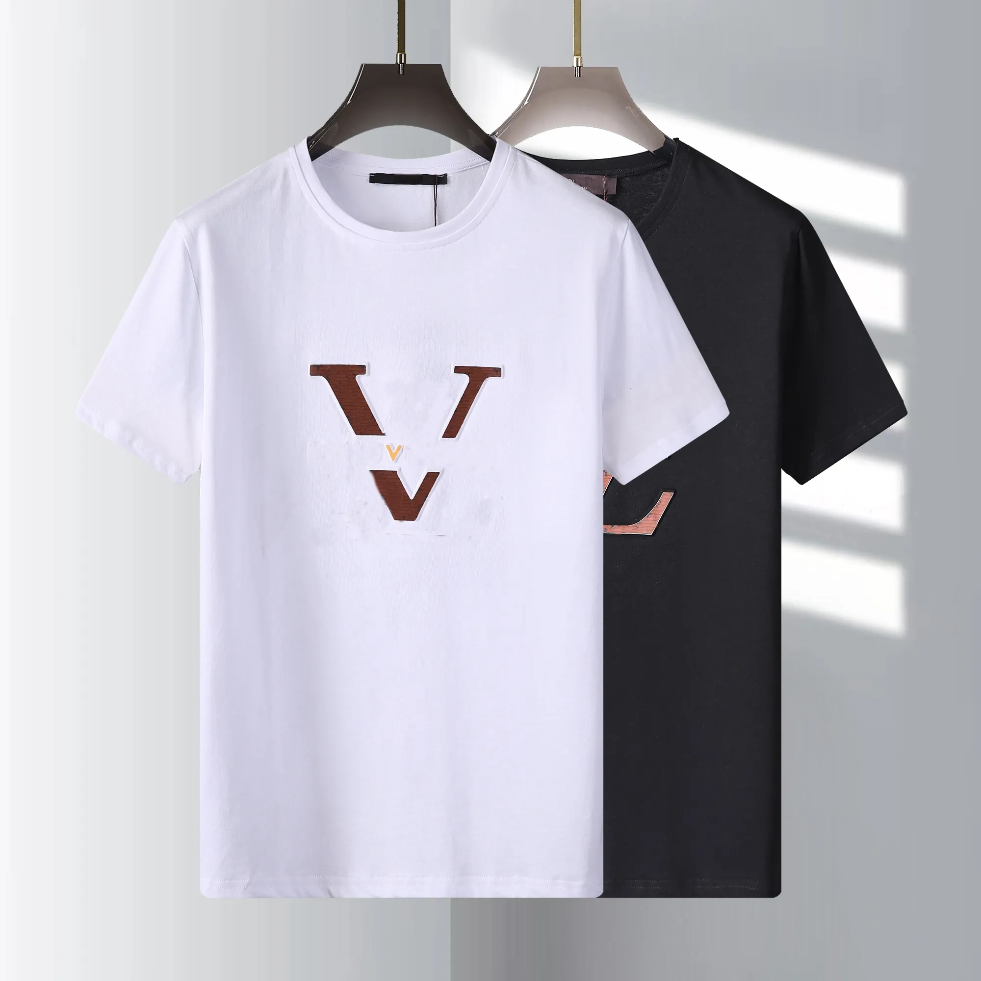Erkek Tees Kadın Tişörtleri Tasarımcı T-Shirts Pamuk Üstleri Adam Sıradan Gömlek Luxurys Tshirts Giyim Sokak Şortlu Kol Giysileri M-3XL