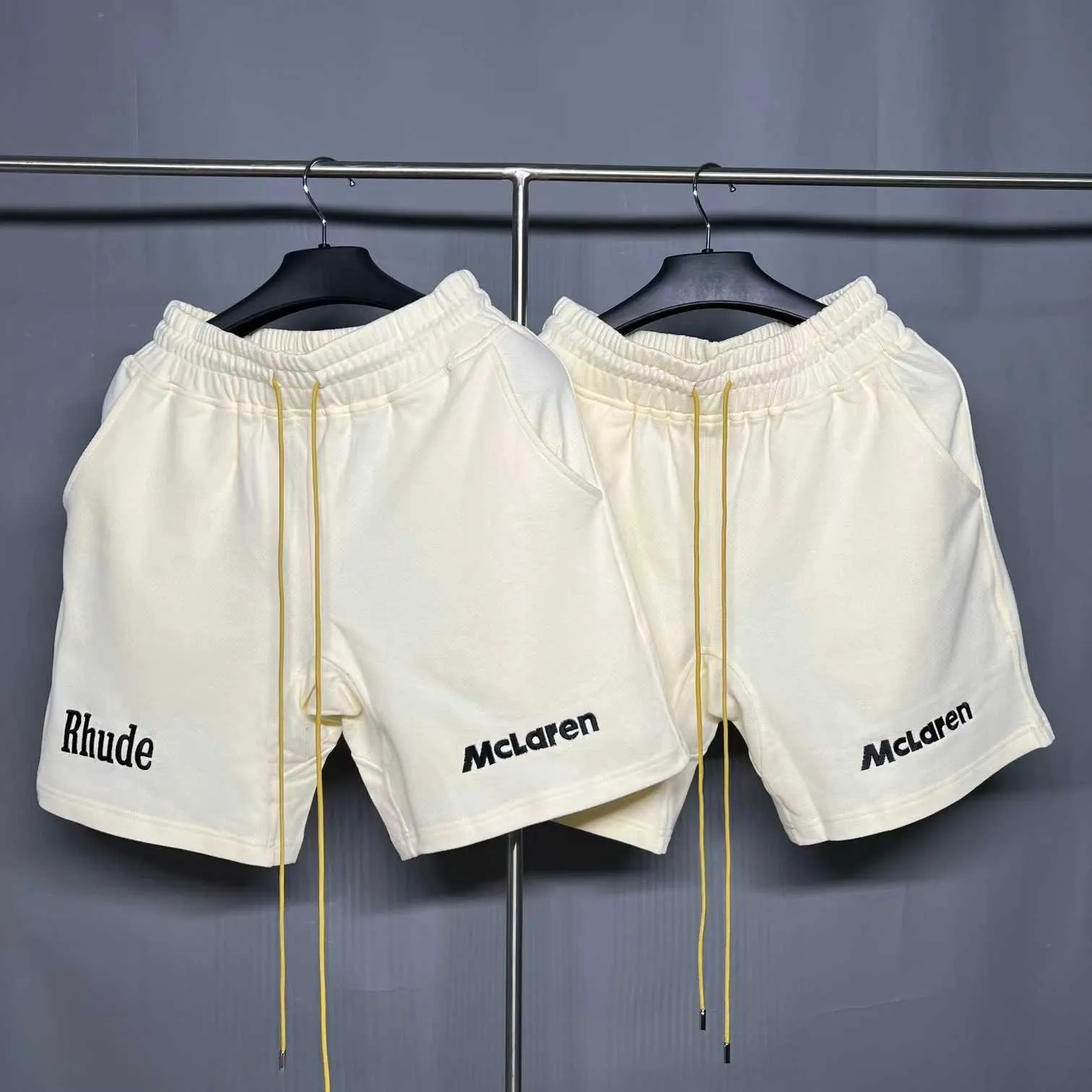 Abbigliamento firmato Rhude x Mclaren Co Lettera ricamata con marchio Coulisse Puro cotone Pantaloncini casual Pantaloni medi Sport High Street Coppie Joggers Abbigliamento sportivo