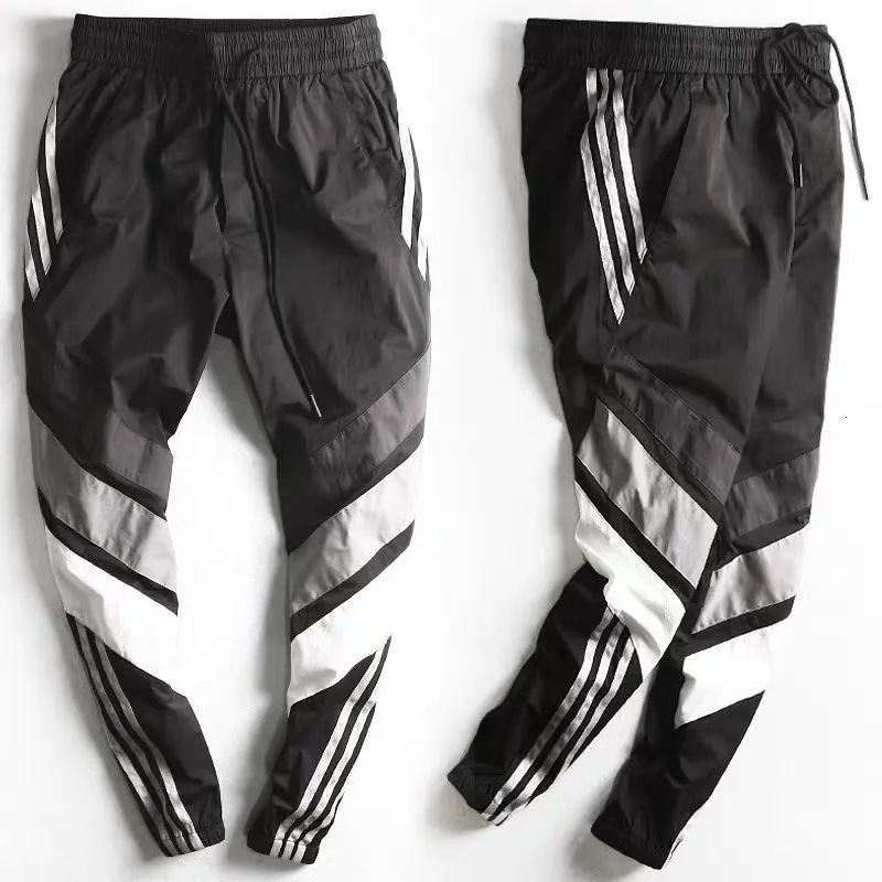 Herrenhose Frühling Sommer Sporthose Herren Werkzeughose Männlich Strahl Füße Männlich Jugendversion Schließfüße Neun Punkte Hose Freizeithose 230422