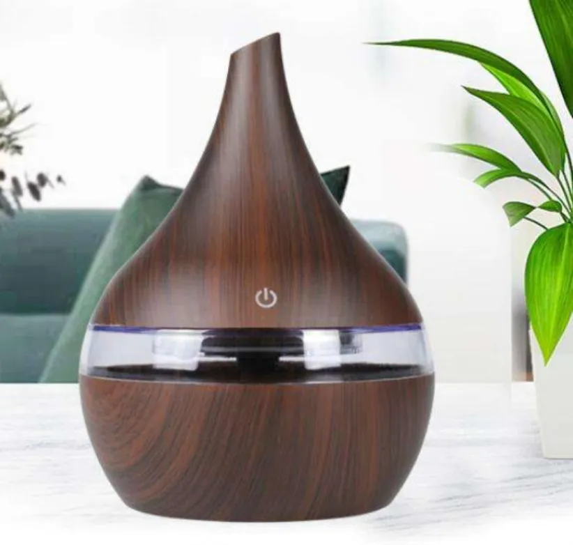 Autres équipements de beauté 300ml Aroma Huile Essentielle Diffuseur Ultrasonique Humidificateur d'air Purificateur avec forme de grain de bois 7 couleurs changeantes LED Ligh