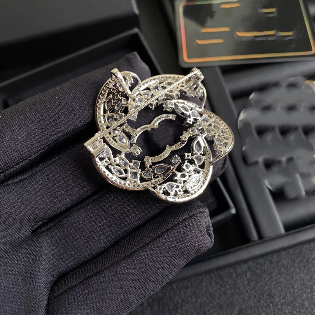 Designer brooch best sale sale