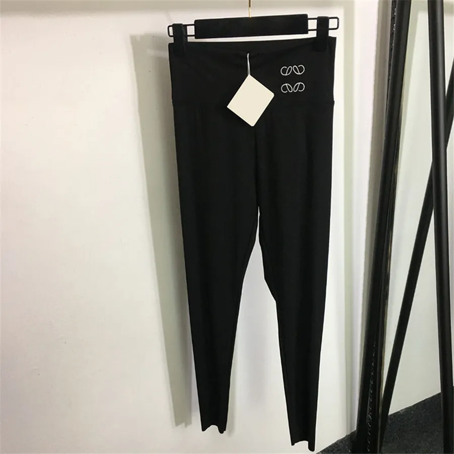 Pantaloni legging da ciclismo da donna ad alta attesa con lettere ricamate leggings da yoga neri pantaloni sportivi da palestra attillati