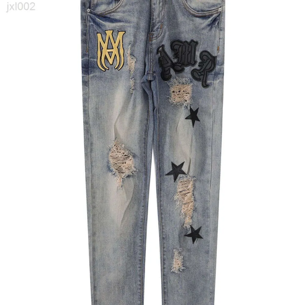 Ami Jeans Jeans viola Jeans firmati Donna nuovi Jeans Ami High Street con taglio a foro Pantaloni slim fit mendicante a botte dritta Pantaloni lavati