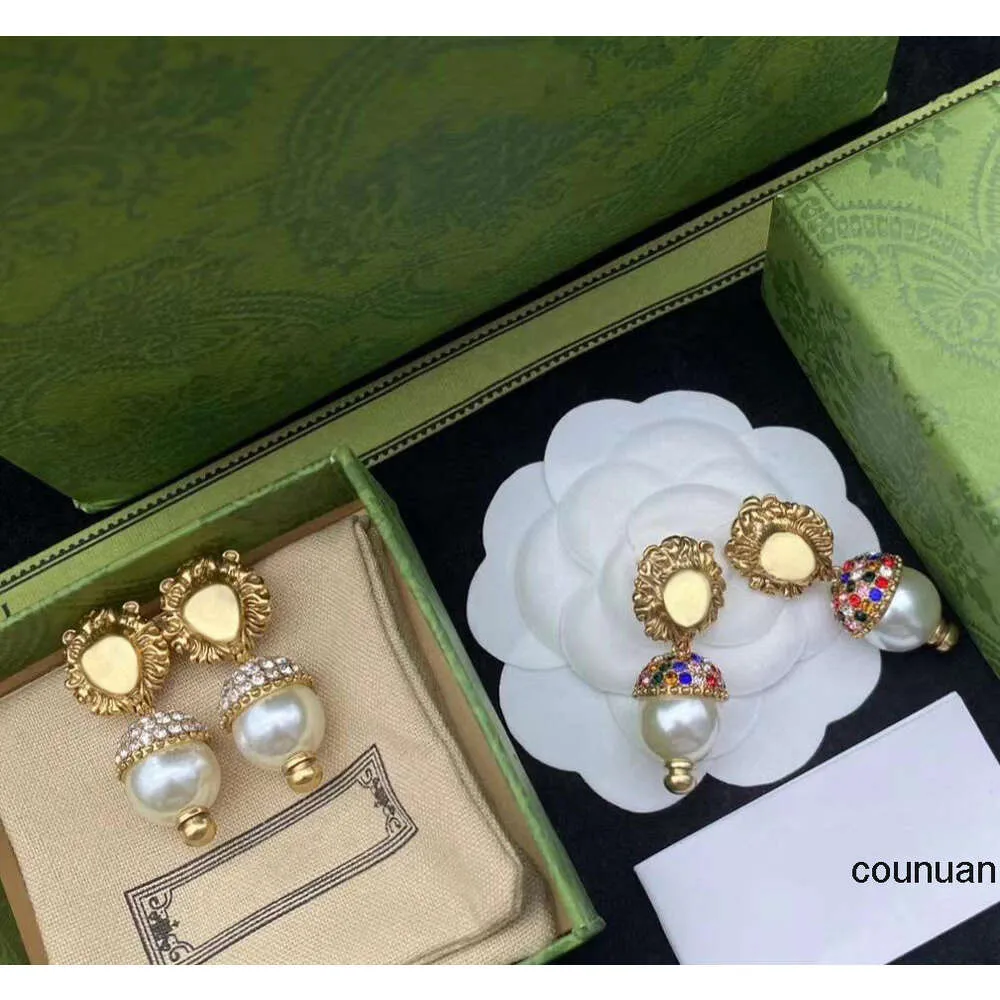 Projektantki kolczyki na uszach Kolczyzny żyrandol moda złota kolczyki stadninowe wisiorek dla kobiet luksurys biżuterii perłowe lew pierścień uszy panie