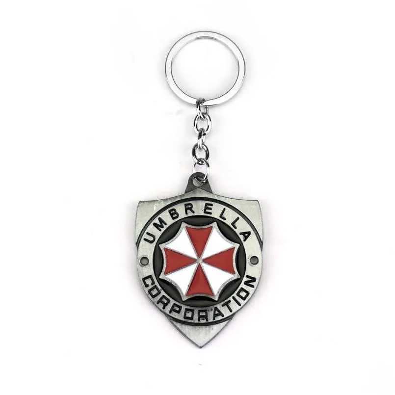 Keychains Landards Resident Evil 2 Renk alaşım Keychain Şemsiye Şirketi Logo Kalkanı Şekli Hayranlar için Hoder Eşsiz Film Takı Dhnyh