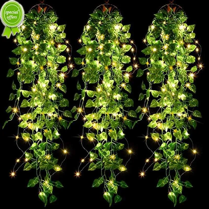 Neue 2,9 ft im Dunkeln leuchtende künstliche LED-Hängepflanze Vine Home Wandbehang gefälschte Blätter Lichterketten Hochzeitsdekorationen