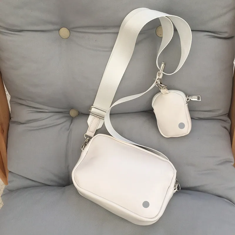 LL Kobiety Mężczyźni Torba Crossbody Torby na ramię na siłownię Sporty na świeżym powietrzu Telefon podróżny Moneta Mini torebka Torba na klatkę piersiową Regulowane saszetki Dwa kawałki Listonoszki