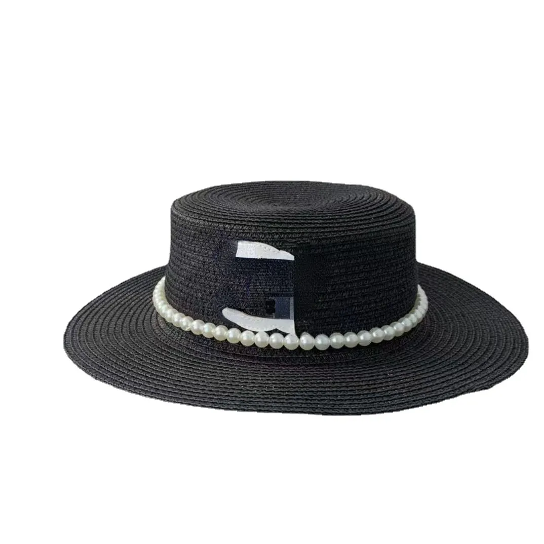 Klassieke Franse elegante vintage Pearl Top Hoed Lederen Tag Vrouwelijke mode Trending Elegante platte top Zonneschaduw Niche Straw Hat Fashion