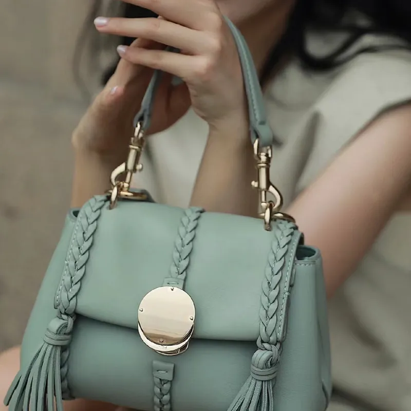 7a trança saco designer penelope bolsa de ombro borla superior couro de luxo mulheres bolsa de alta qualidade couro alça superior saco trança crossbody sacos com alças e chaves