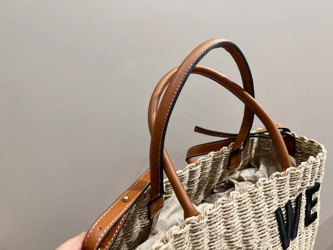 Fashionable high-end Lafite straw bag Tote portable bag, large capacity handwoven women`s vacation bag, designer leather handle and shoulder strap ID michafl_kops