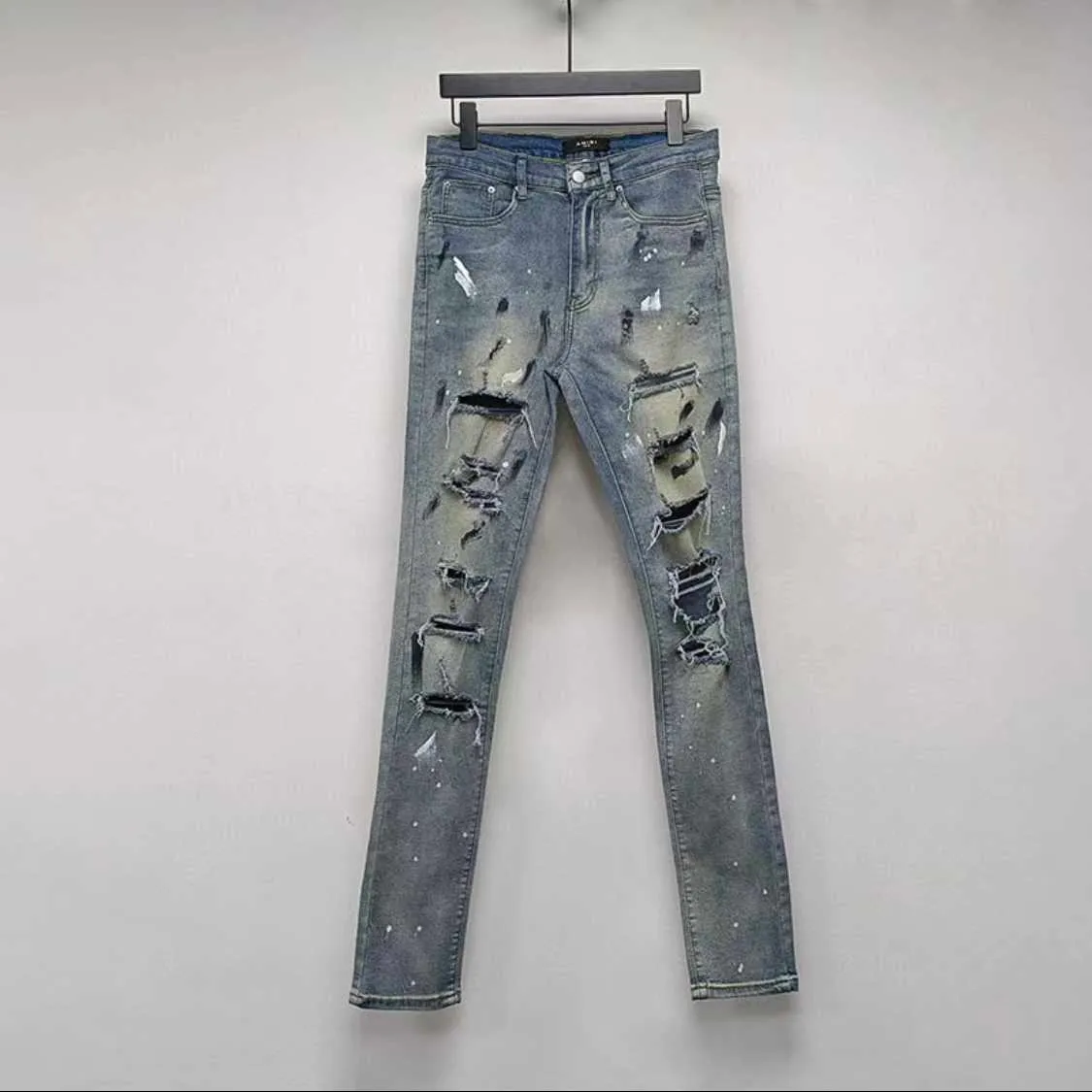 Designerkleding Spijkerbroek Amiiri Speckled Ink Hole Blue Jeans Handgemaakt Mes gesneden Beschadigd High Street Elastic Water Wash Gebruikt Slim Fit Distressed Ripped Pants