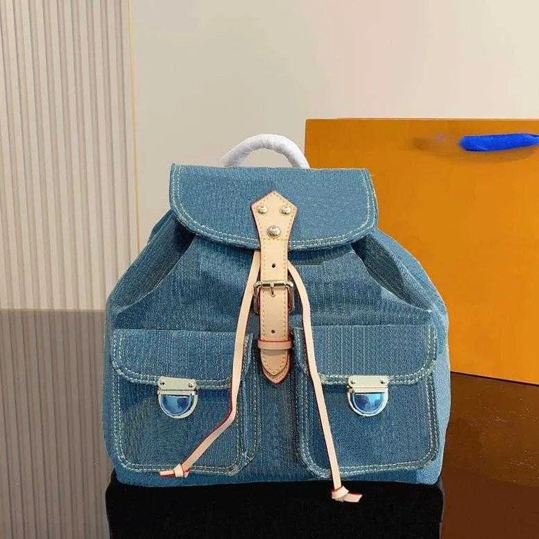 Designers de bolsas de mochila de luxo Backpacks Mulheres jeans bookbags Moda Moda Bolsa de Viagem ao Ar Livre Classic Capacidade Multifuncional Pacotes 231115