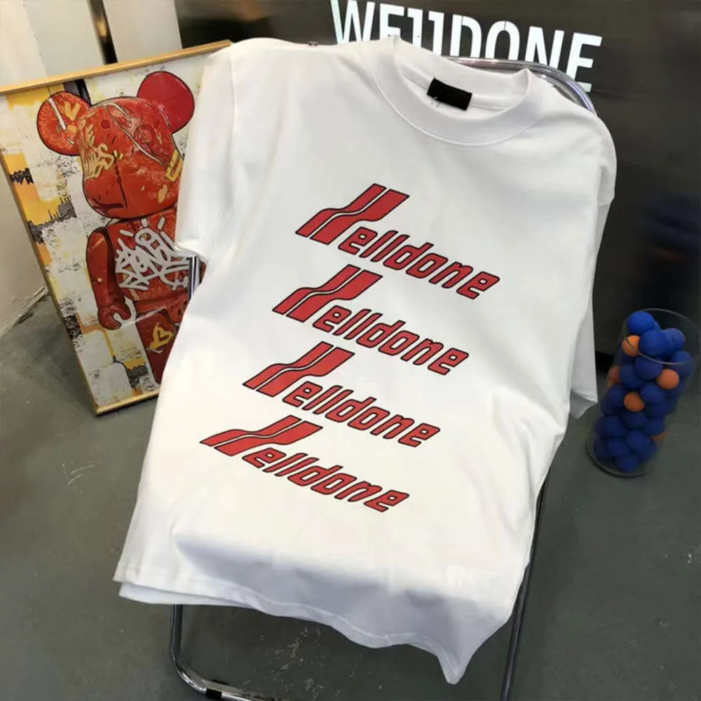【関税込み】We11done グレー Gothic Tシャツ We11done graphic-print Cotton T-shirt | Grey | FARFETCH