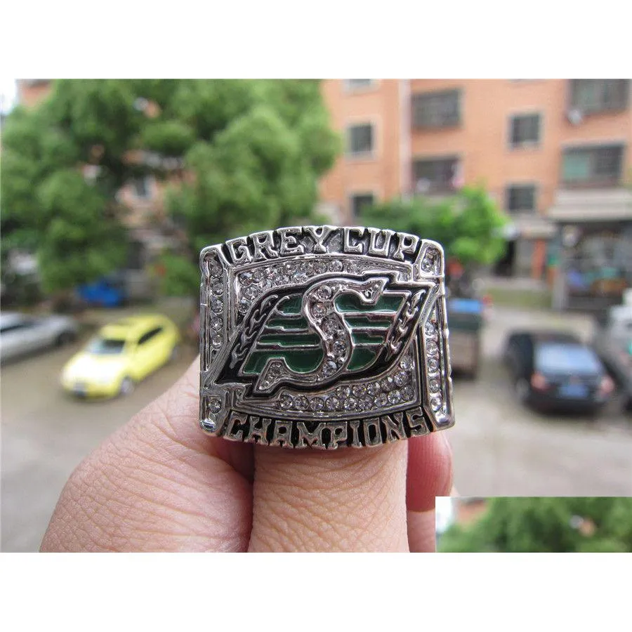 Bagues de cluster 2007 Saskatchewan Roughriders La Coupe Grey Championnat Bague avec boîte en bois Hommes Fan Souvenir Cadeau En Gros Drop Drop D DDHXGS