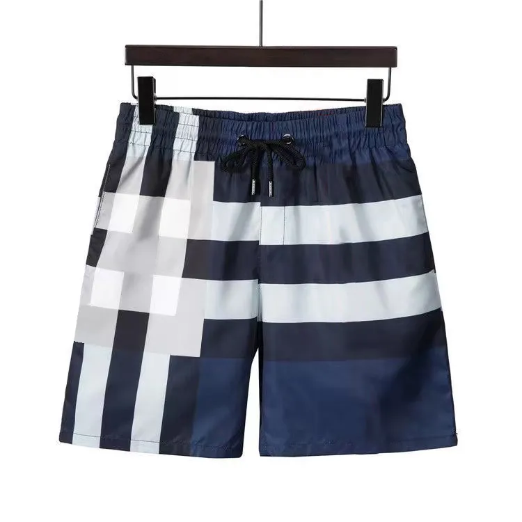 Pantaloncini da uomo da uomo Designer Estate Donna I pantaloncini a righe sono eleganti pantaloncini da bagno Casual Sport Palestra Asciugatura rapida Pantaloni da spiaggia uomo Bianco e nero Taglia asiatica 0IYE