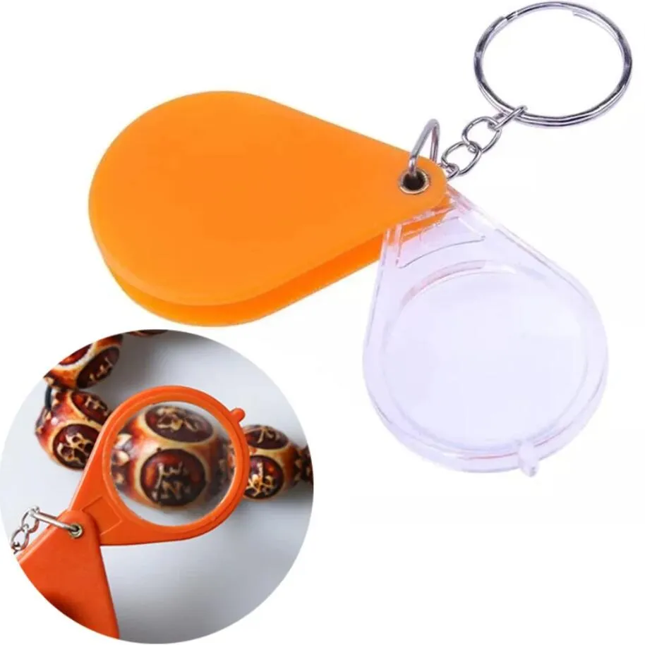 Portable Handheld Folding Plastic Keychain Magnifier With Orange Lens