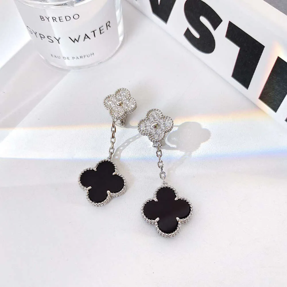 Klavertje vier luxe designer sieradenVier gras twee bloemen volledige diamanten zwarte agaat oorbellen met Panda S zilveren precisie-editie