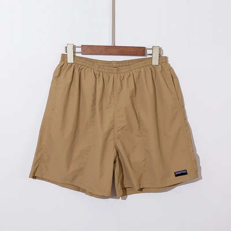 Homem shorts shorts masculinos shorts designers saquinhos de moletom esportes de corrida de praia calças de férias casuais soltas calças secas rápidas e secas cáqui color m-xxl